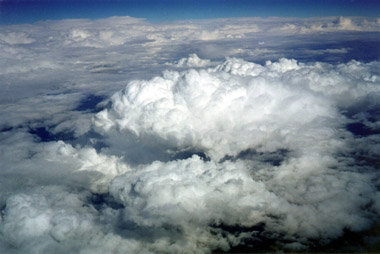 Swelling Cumulus with Pileus (Skullcap)